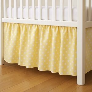 Yellow polkadot crib skirt